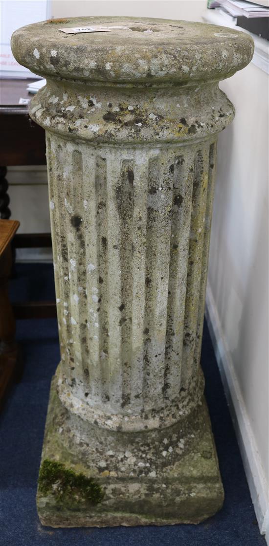 A fluted pedestal H.93cms